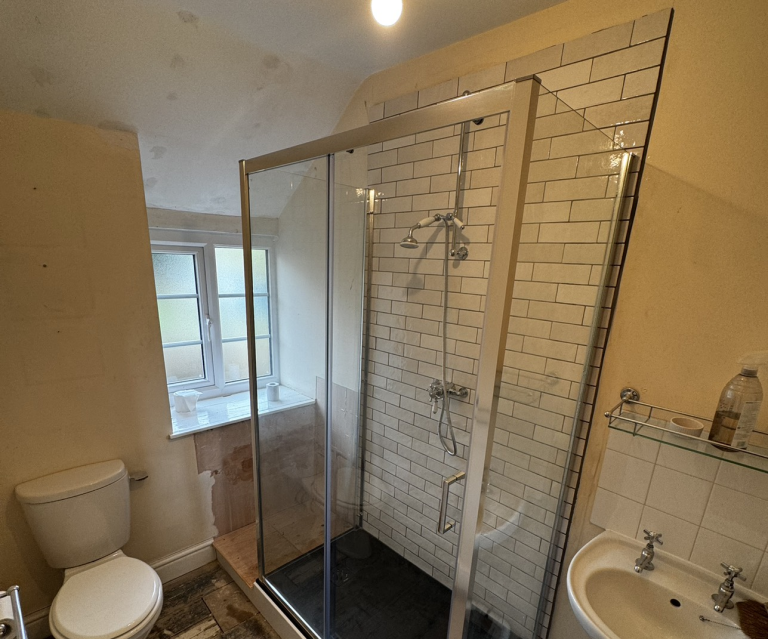 Tiled Shower With Sliding Guard