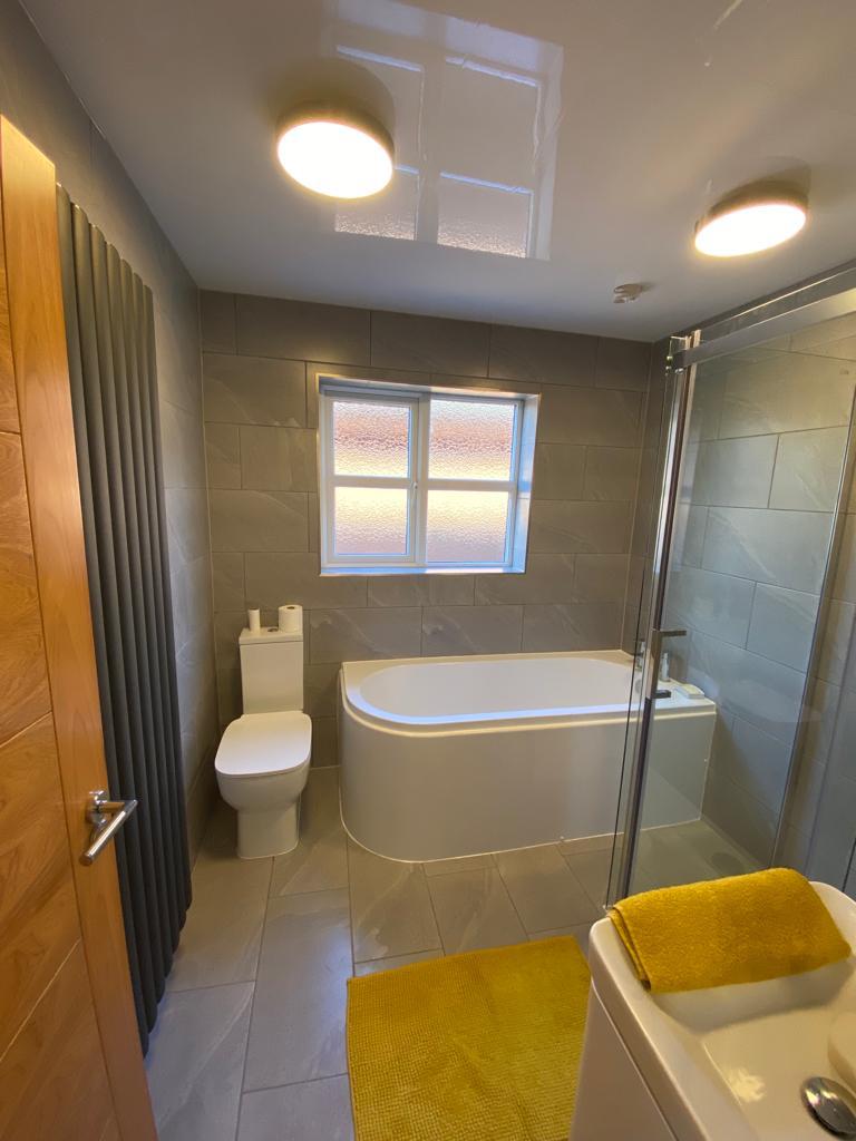 Modern Bathroom With Hint of Yellow