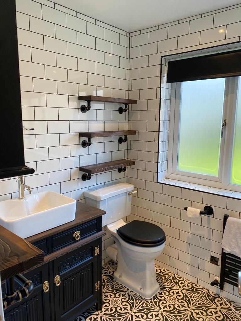 Boho Style Bathroom With Towel Racks