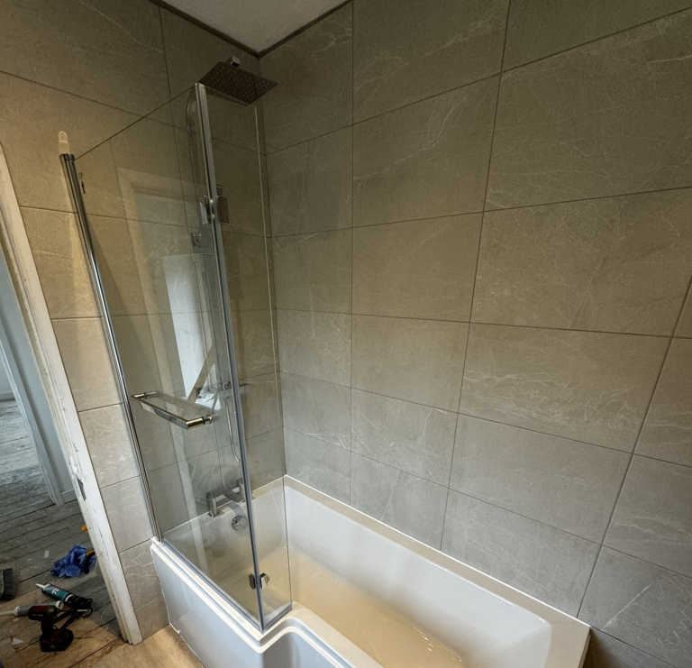 Bathroom install with guard